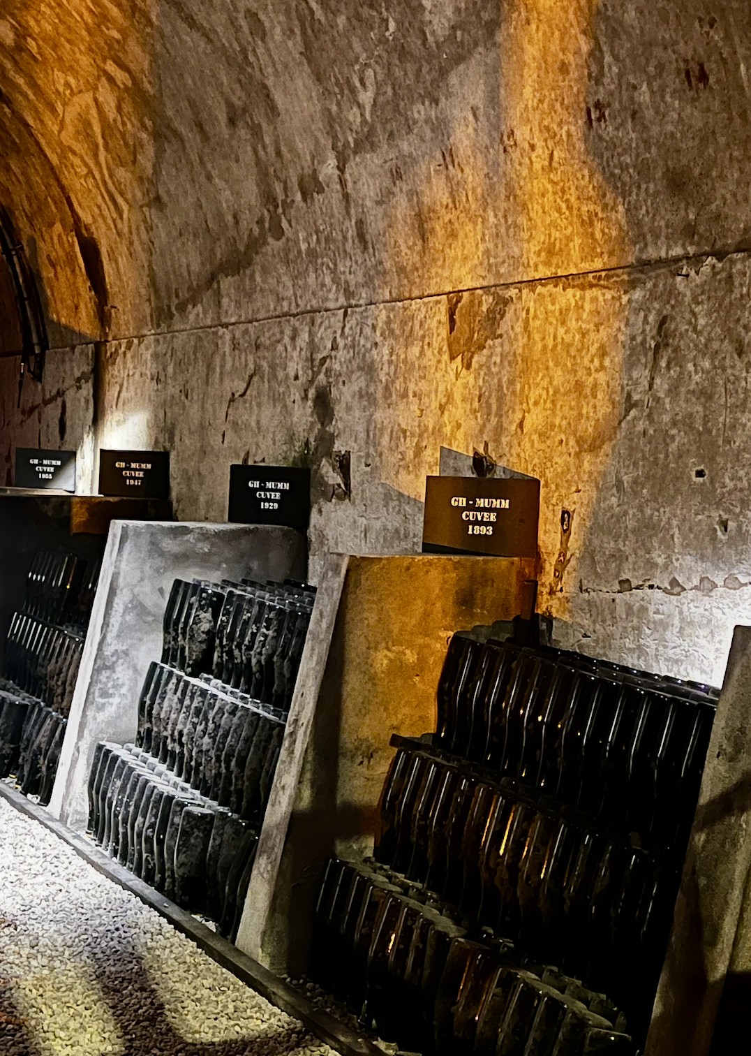 Vintage G. H. Mumm champagne bottles on display, Reims, France