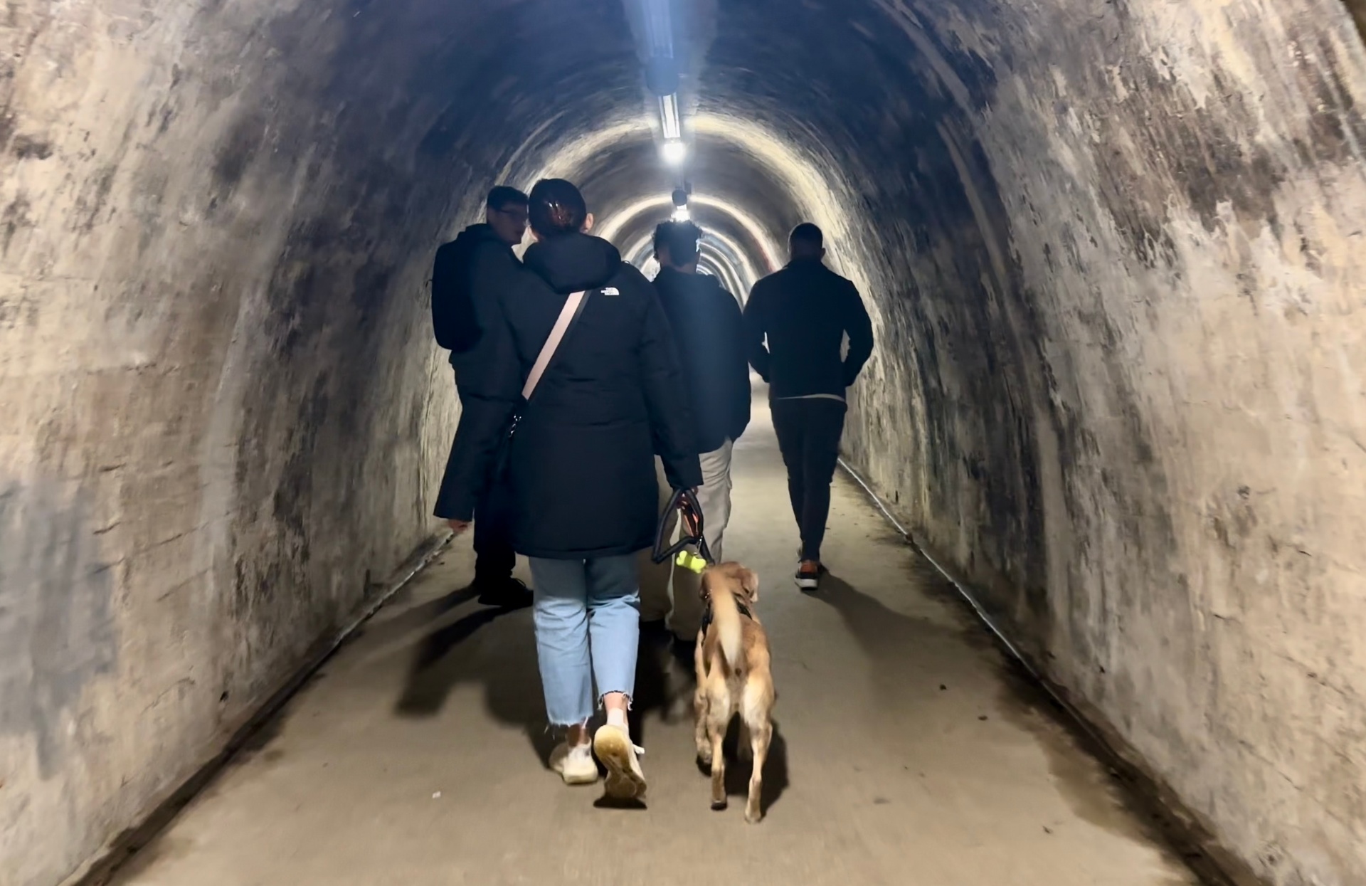 Visitors walking through the Grič Tunnel in Zagreb